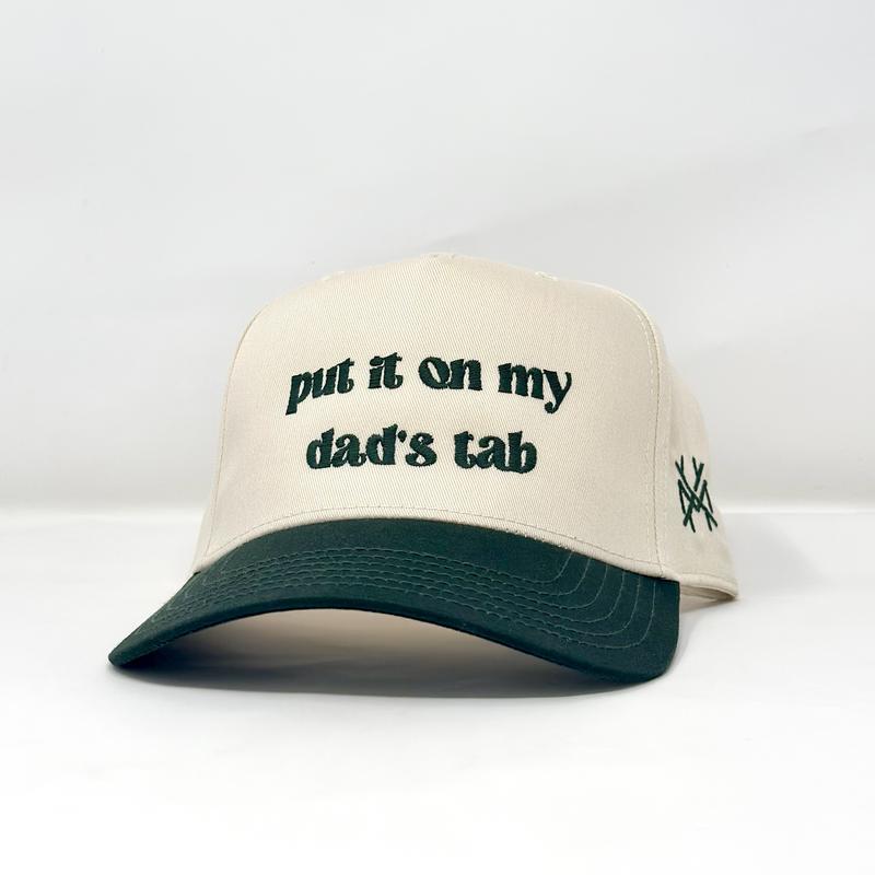 Put It On My Dad's Tab Mad Hatter Company Trucker Hat