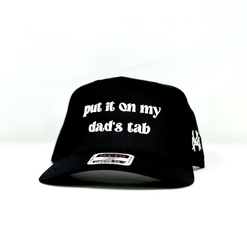 Put It On My Dad's Tab Mad Hatter Company Trucker Hat