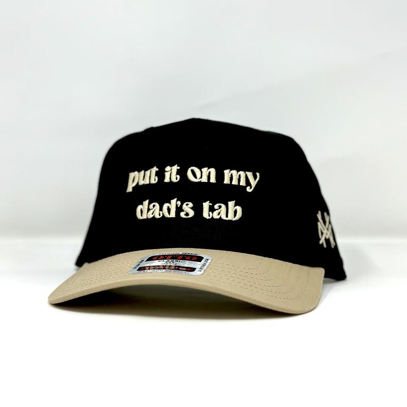 Put It On My Dad's Tab Mad Hatter Company Trucker Hat