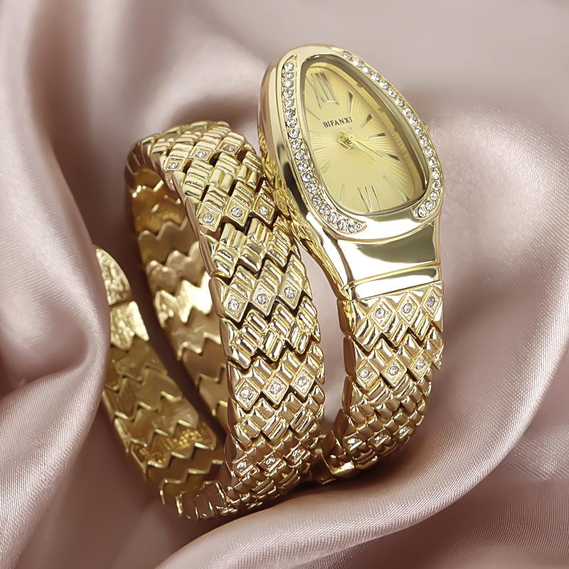 Snake-shaped bracelet watch winding fashion three-pin quartz watch small dial Diamond-embedded light luxury minimalism WOMEN'S watch