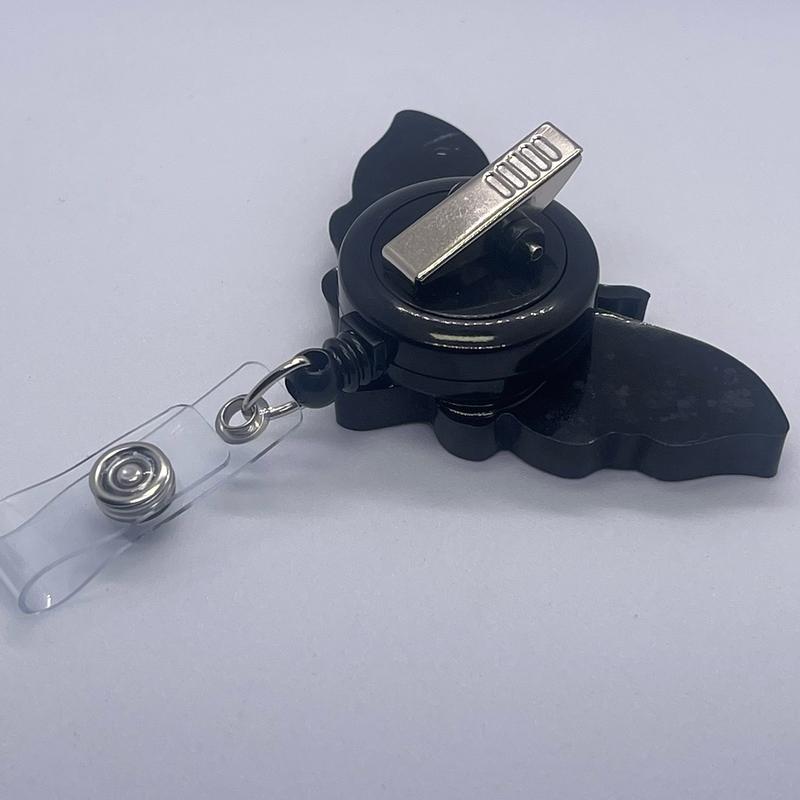 Black deadhead moth badge reel