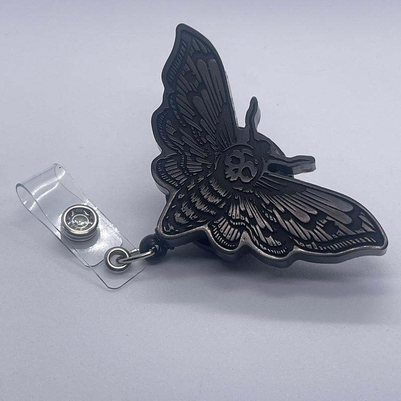 Black deadhead moth badge reel